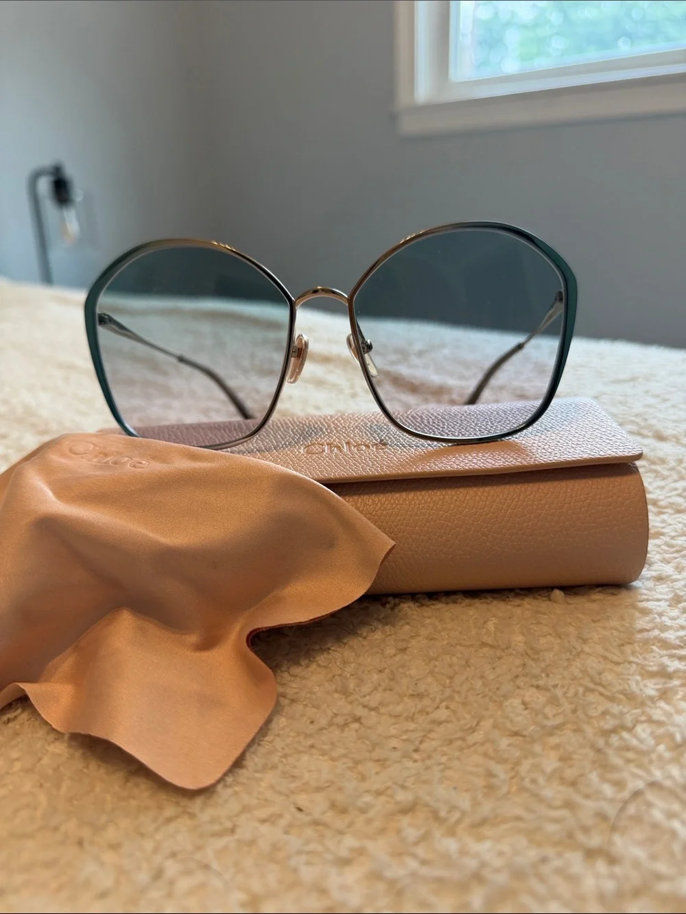 Chloe Silver Frame Sunglasses with Teal Gradient Lenses and pink Case